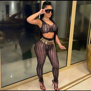 See through, holes 2 piece outfit in size Large & small